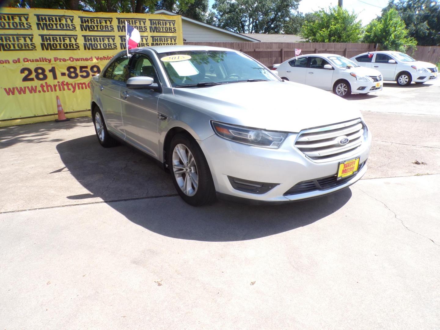 2015 Ford Taurus SEL FWD (1FAHP2E98FG) with an 2.0L L4 DOHC 16V engine, 6-Speed Automatic transmission, located at 16710 Clay Rd., Houston, TX, 77084, (281) 859-7900, 29.834864, -95.656166 - Photo#2