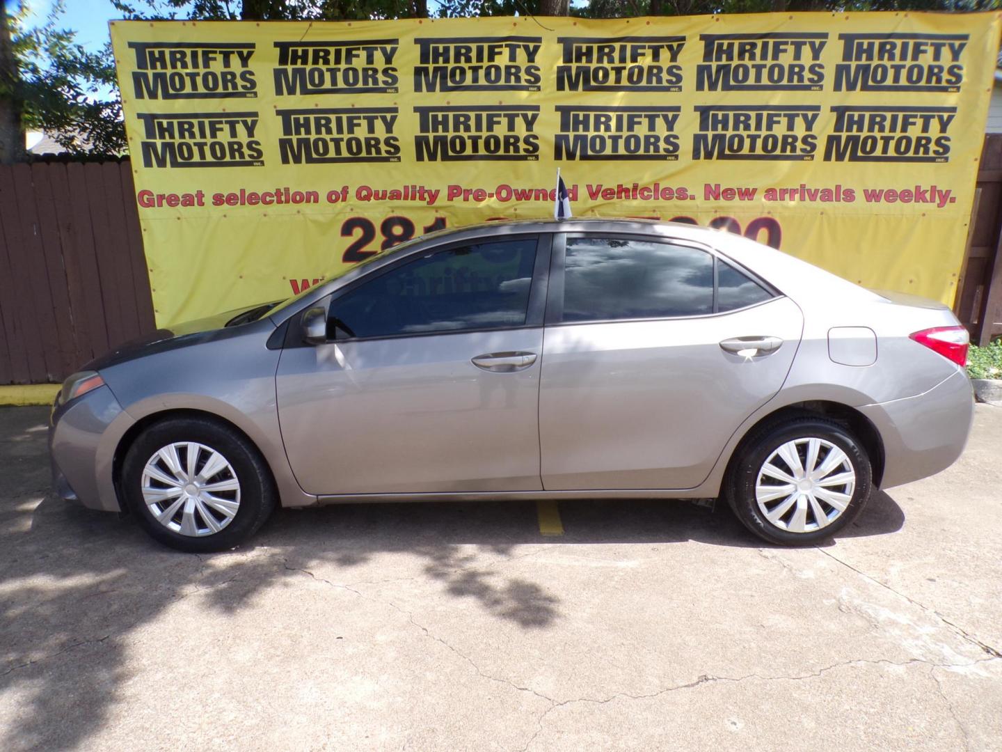 2015 Toyota Corolla L 4-Speed AT (5YFBURHE1FP) with an 1.8L L4 DOHC 16V engine, 4-Speed Automatic transmission, located at 16710 Clay Rd., Houston, TX, 77084, (281) 859-7900, 29.834864, -95.656166 - Photo#0