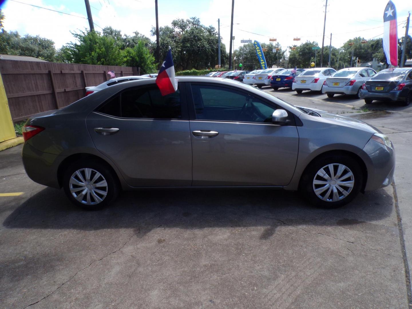 2015 Toyota Corolla L 4-Speed AT (5YFBURHE1FP) with an 1.8L L4 DOHC 16V engine, 4-Speed Automatic transmission, located at 16710 Clay Rd., Houston, TX, 77084, (281) 859-7900, 29.834864, -95.656166 - Photo#1