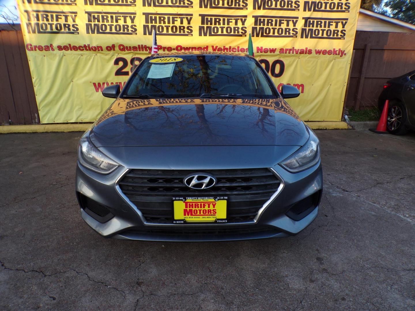 2018 Gray /Gray Hyundai Accent SEL 4-Door 6A (3KPC24A33JE) with an 1.6L L4 DOHC 16V engine, Automatic 6-Speed transmission, located at 16710 Clay Rd., Houston, TX, 77084, (281) 859-7900, 29.834864, -95.656166 - Photo#0