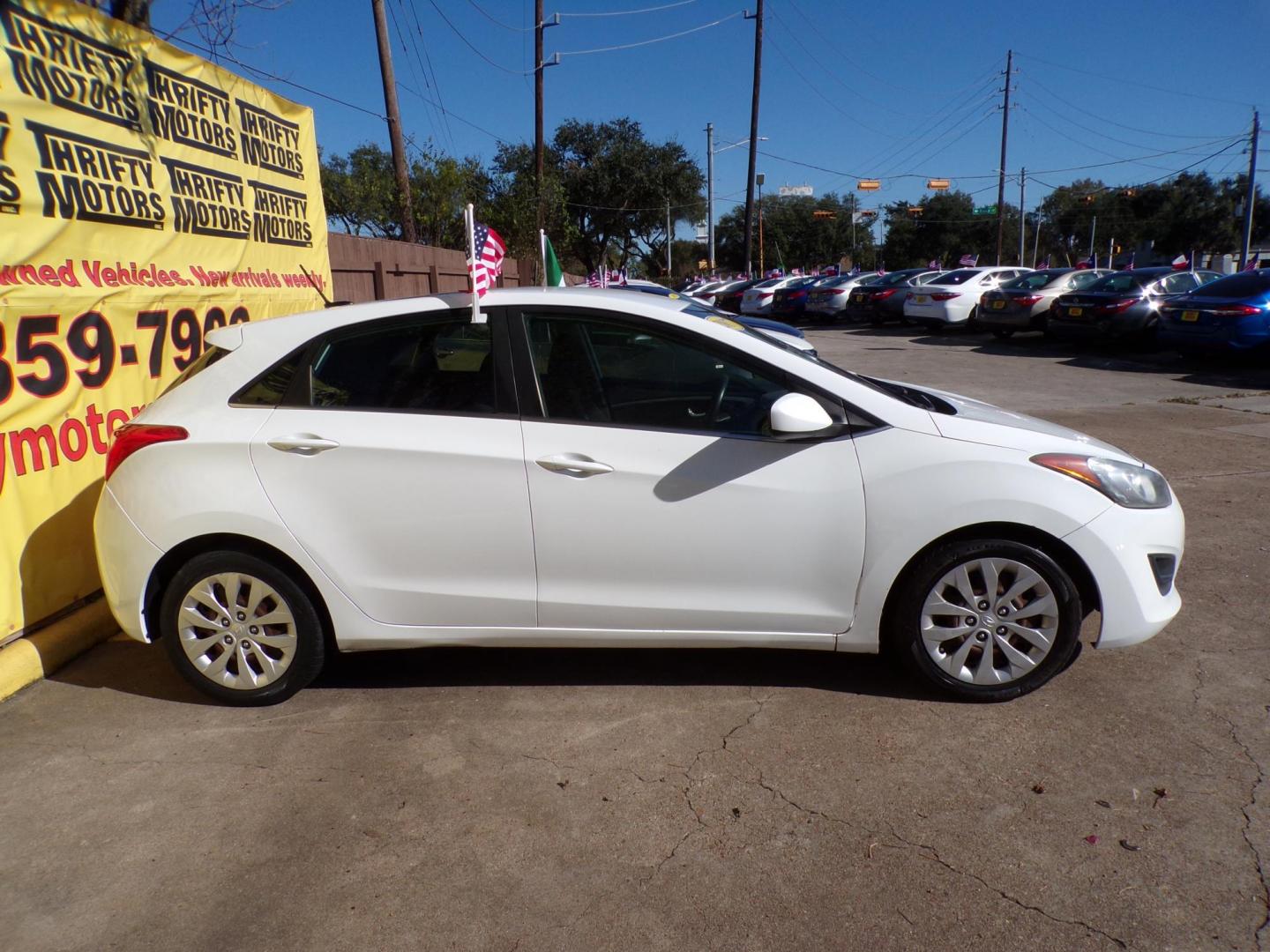 2017 White /Black Hyundai Elantra GT M/T (KMHD35LH7HU) with an 2.0L L4 16V DOHC engine, 6M transmission, located at 16710 Clay Rd., Houston, TX, 77084, (281) 859-7900, 29.834864, -95.656166 - Photo#3