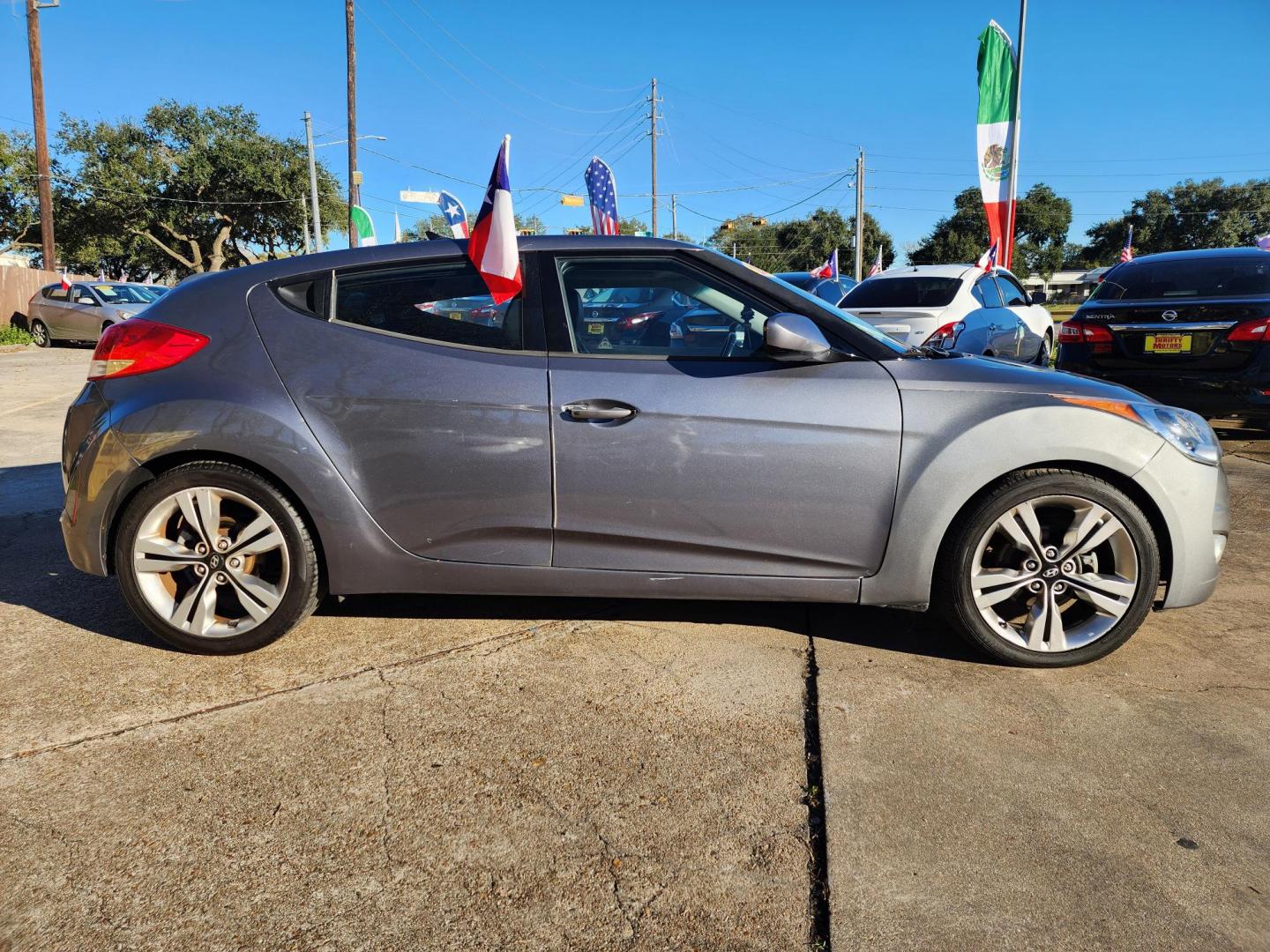 2013 Gray /Gray Hyundai Veloster Base (KMHTC6AD6DU) with an 1.6L L4 DOHC 16V engine, located at 16710 Clay Rd., Houston, TX, 77084, (281) 859-7900, 29.834864, -95.656166 - Photo#4