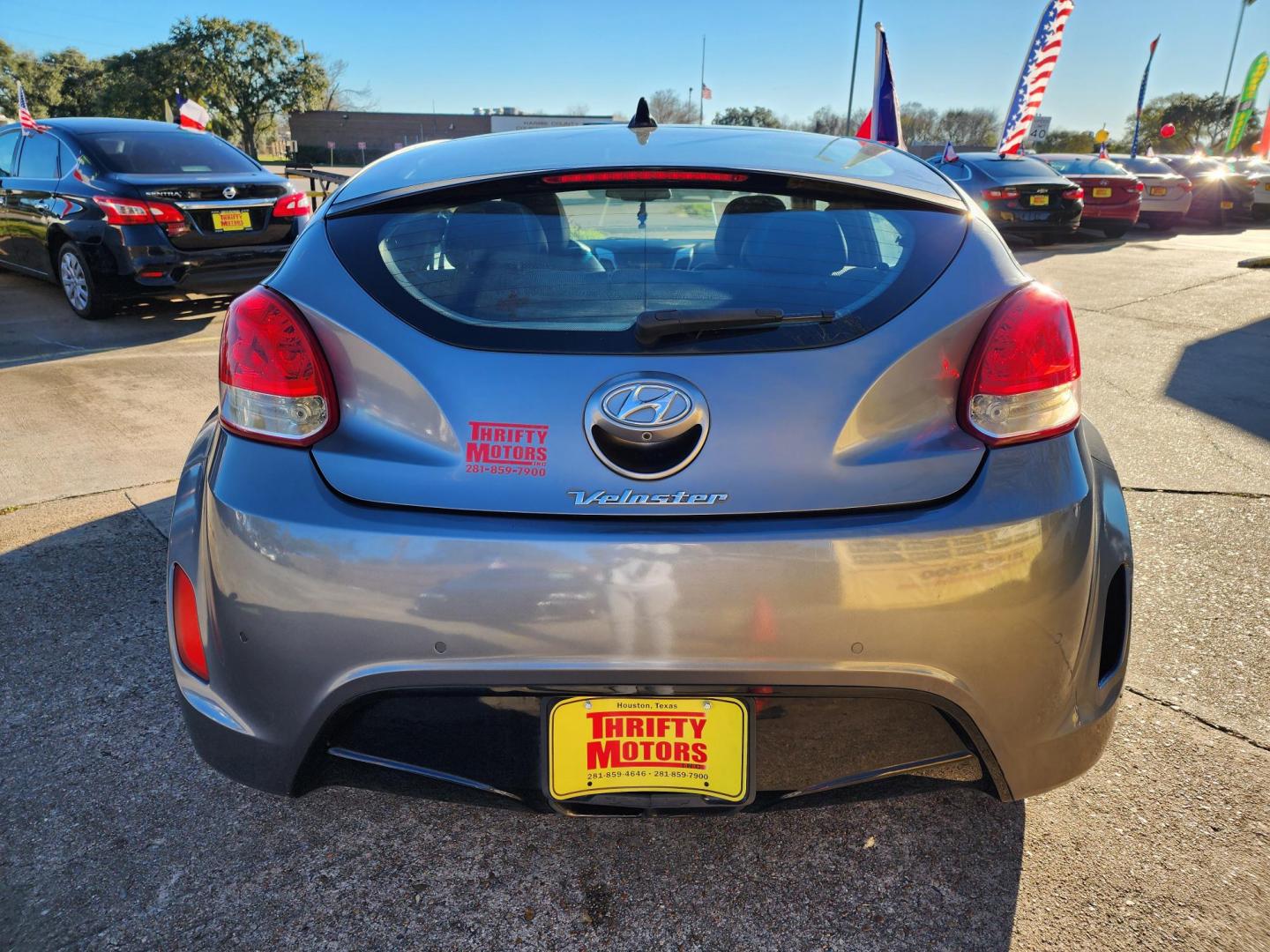 2013 Gray /Gray Hyundai Veloster Base (KMHTC6AD6DU) with an 1.6L L4 DOHC 16V engine, located at 16710 Clay Rd., Houston, TX, 77084, (281) 859-7900, 29.834864, -95.656166 - Photo#12