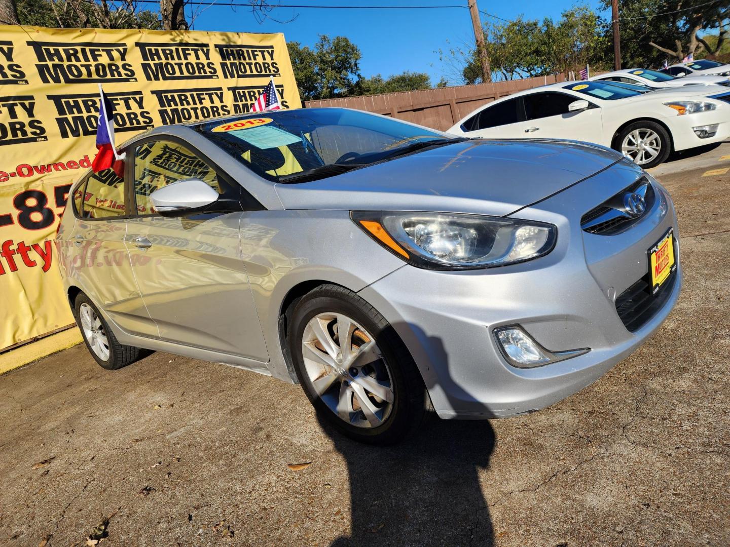 2013 Silver /Gray Hyundai Accent SE 5-Door (KMHCU5AE4DU) with an 1.6L L4 DOHC 16V engine, located at 16710 Clay Rd., Houston, TX, 77084, (281) 859-7900, 29.834864, -95.656166 - Photo#2