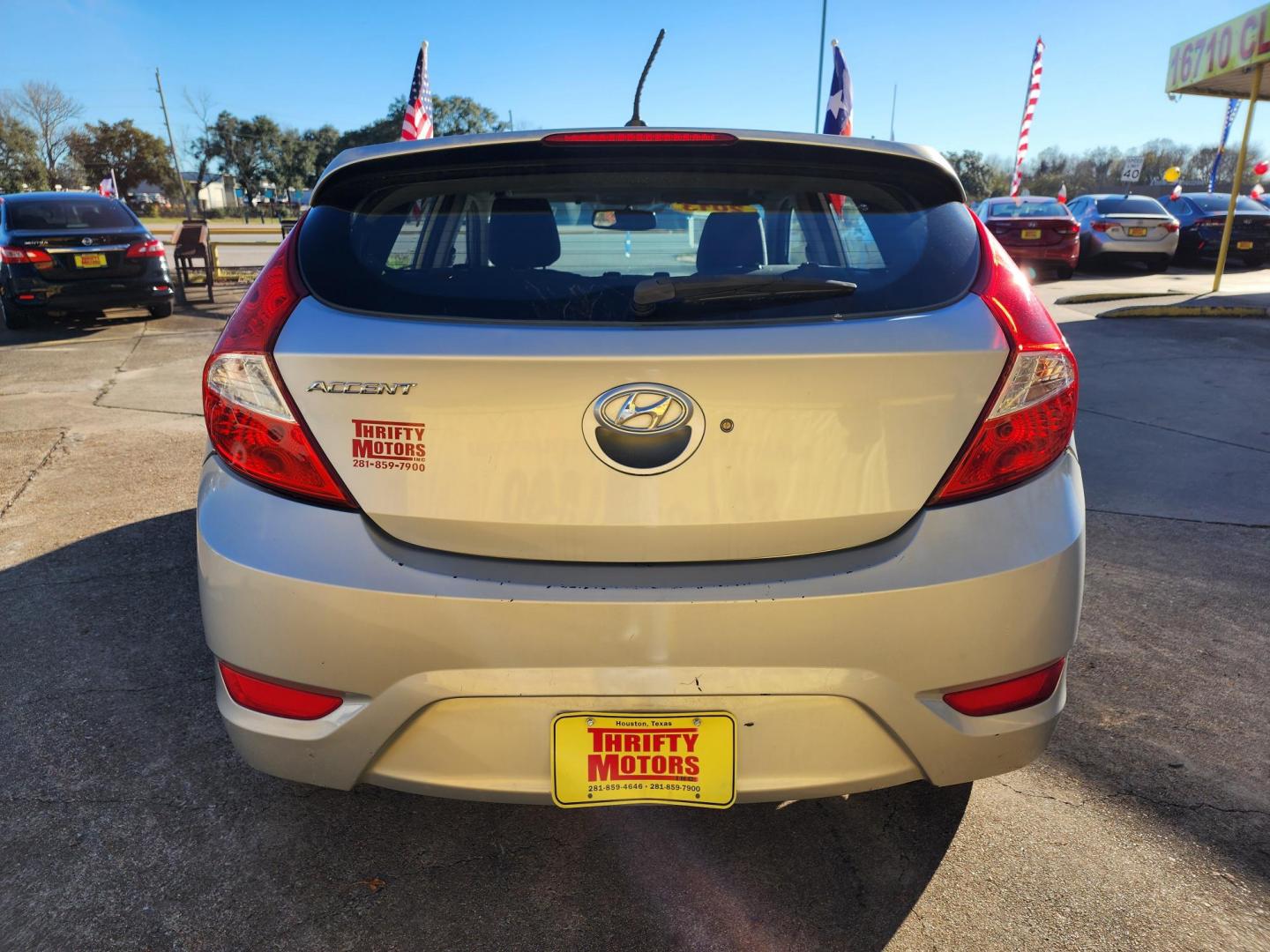 2013 Silver /Gray Hyundai Accent SE 5-Door (KMHCU5AE4DU) with an 1.6L L4 DOHC 16V engine, located at 16710 Clay Rd., Houston, TX, 77084, (281) 859-7900, 29.834864, -95.656166 - Photo#9