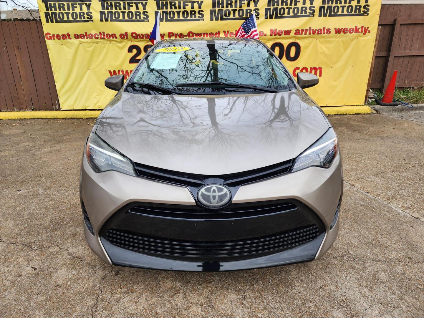 2018 Gray /Gray Toyota Corolla SE 6M (5YFBURHE8JP) with an 1.8L L4 DOHC 16V engine, 6M transmission, located at 16710 Clay Rd., Houston, TX, 77084, (281) 859-7900, 29.834864, -95.656166 - Photo#0