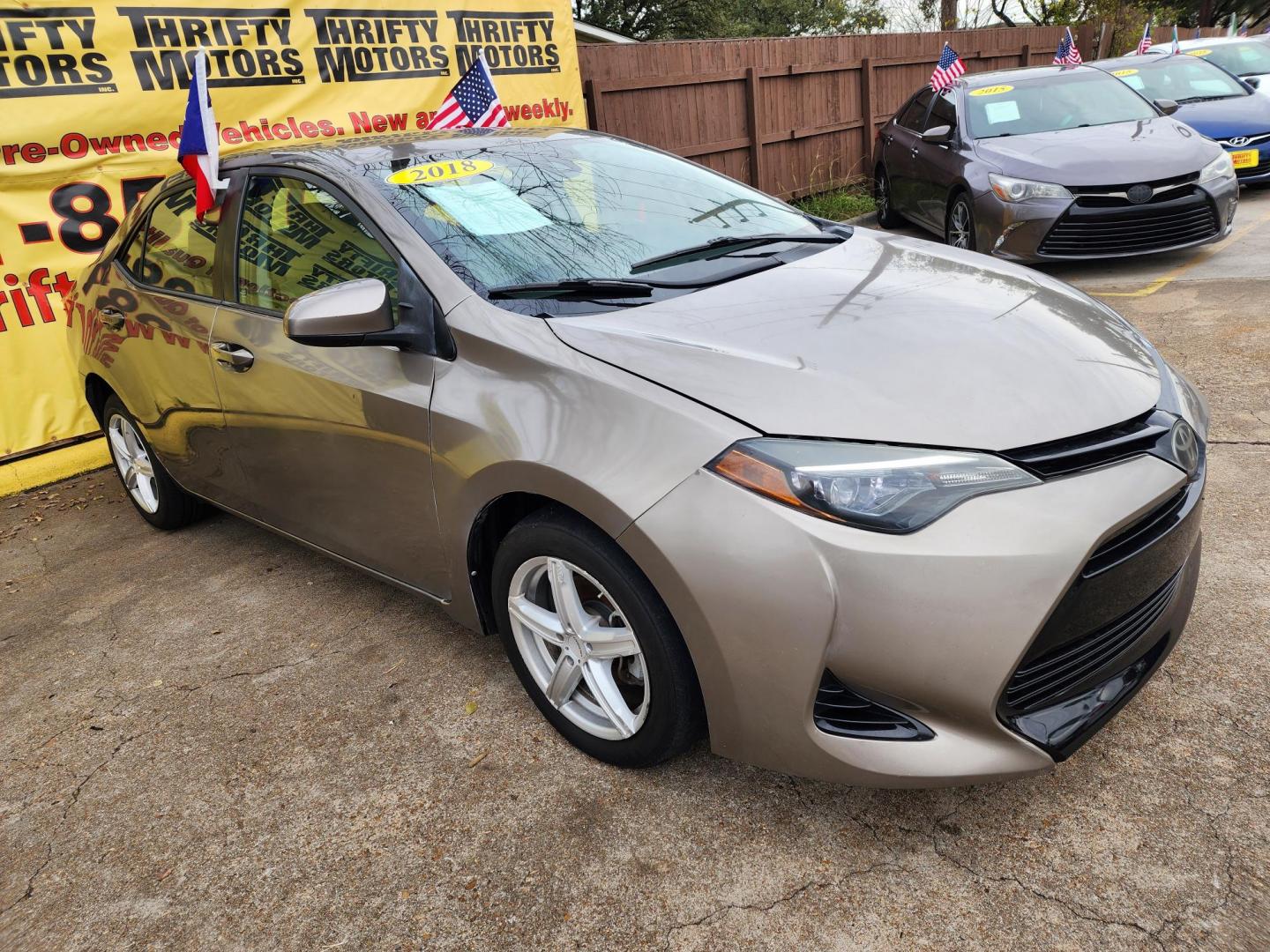 2018 Gray /Gray Toyota Corolla SE 6M (5YFBURHE8JP) with an 1.8L L4 DOHC 16V engine, 6M transmission, located at 16710 Clay Rd., Houston, TX, 77084, (281) 859-7900, 29.834864, -95.656166 - Photo#2