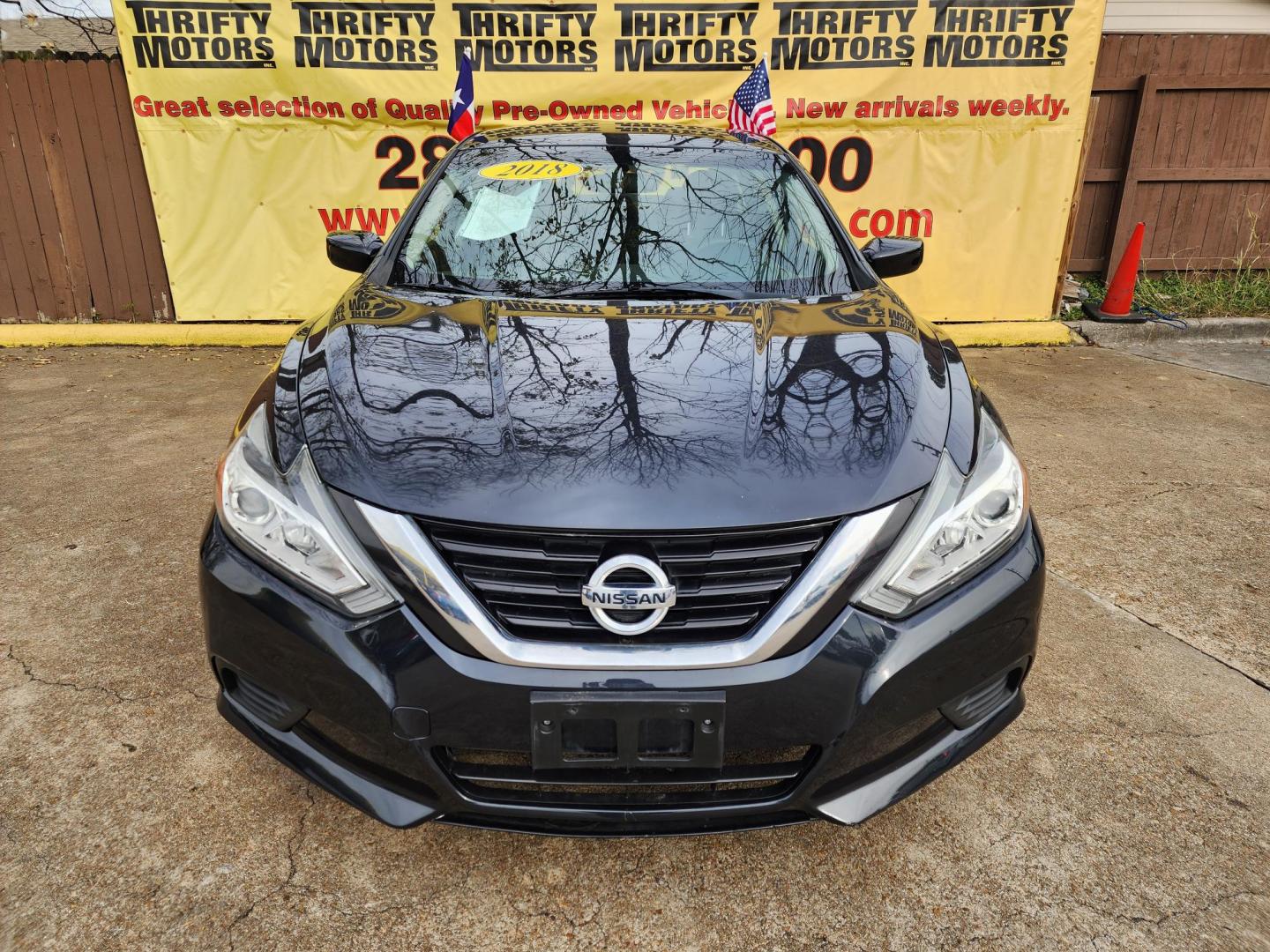 2018 Black /Black Nissan Altima 2.5 (1N4AL3AP8JC) with an 2.5L L4 DOHC 16V engine, CVT transmission, located at 16710 Clay Rd., Houston, TX, 77084, (281) 859-7900, 29.834864, -95.656166 - Photo#0