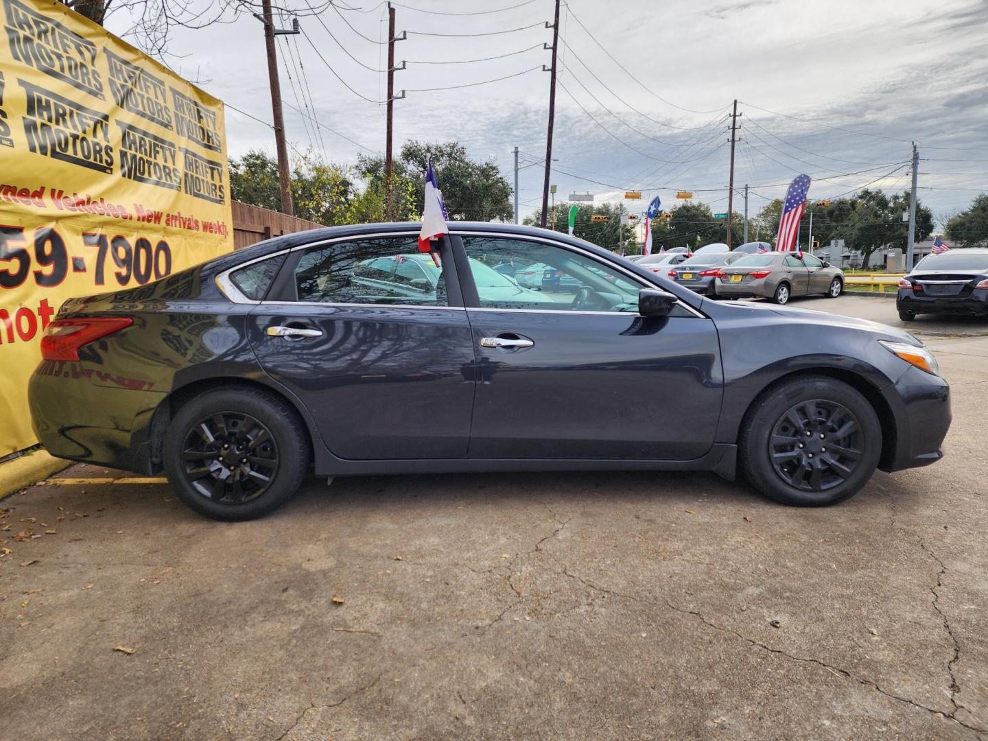 2018 Black /Black Nissan Altima 2.5 (1N4AL3AP8JC) with an 2.5L L4 DOHC 16V engine, CVT transmission, located at 16710 Clay Rd., Houston, TX, 77084, (281) 859-7900, 29.834864, -95.656166 - Photo#3