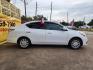 2019 White /Black Nissan Versa 1.6 SV Sedan (3N1CN7AP0KL) with an 1.6L L4 DOHC 16V engine, CVT transmission, located at 16710 Clay Rd., Houston, TX, 77084, (281) 859-7900, 29.834864, -95.656166 - Photo#3