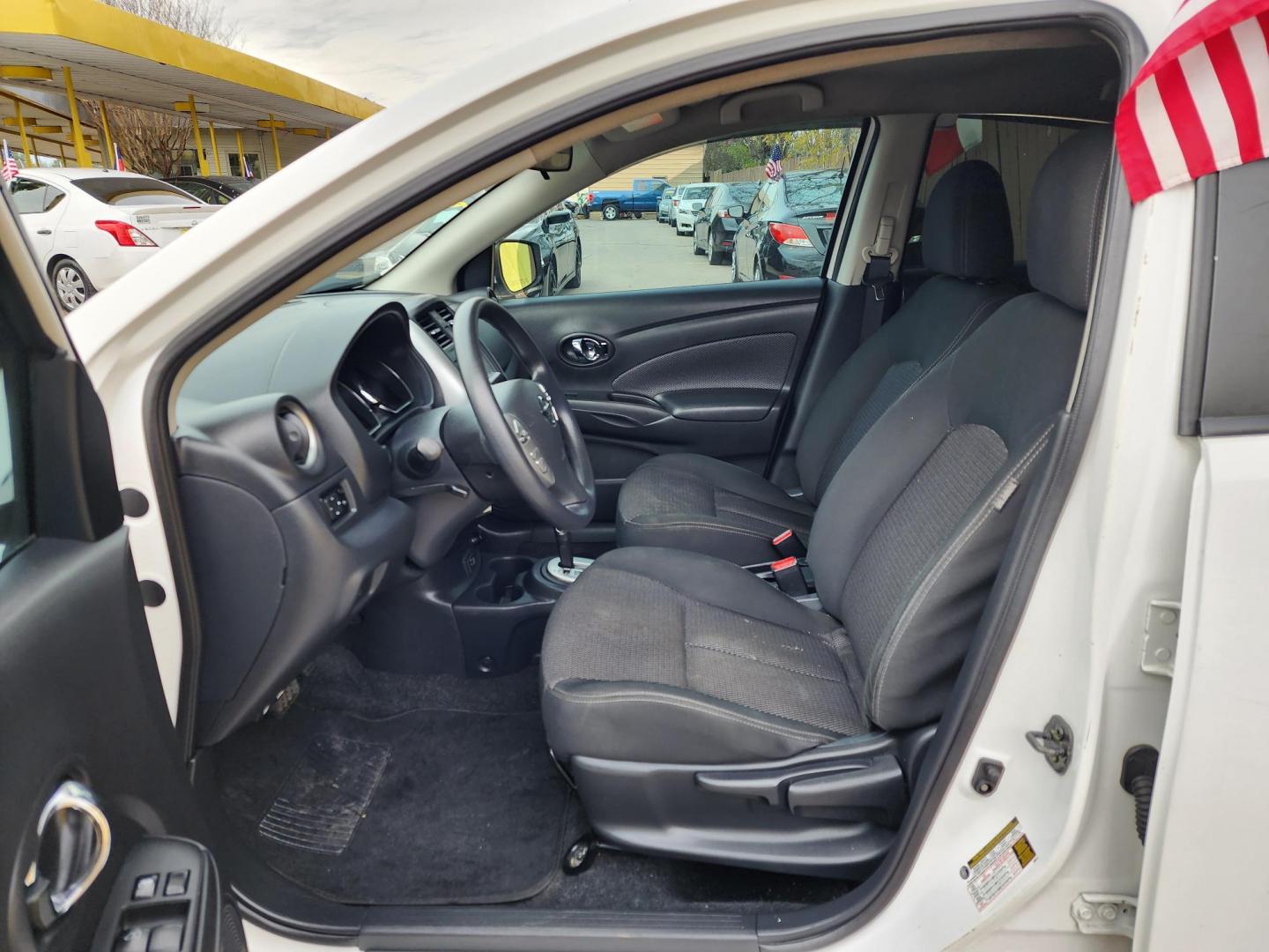 2019 White /Black Nissan Versa 1.6 SV Sedan (3N1CN7AP0KL) with an 1.6L L4 DOHC 16V engine, CVT transmission, located at 16710 Clay Rd., Houston, TX, 77084, (281) 859-7900, 29.834864, -95.656166 - Photo#10