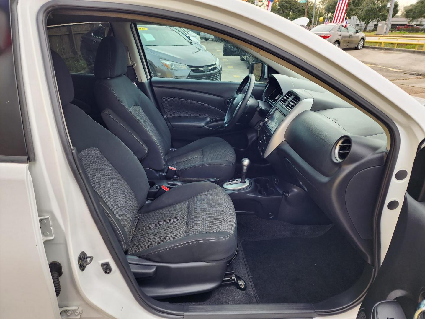 2019 White /Black Nissan Versa 1.6 SV Sedan (3N1CN7AP0KL) with an 1.6L L4 DOHC 16V engine, CVT transmission, located at 16710 Clay Rd., Houston, TX, 77084, (281) 859-7900, 29.834864, -95.656166 - Photo#12