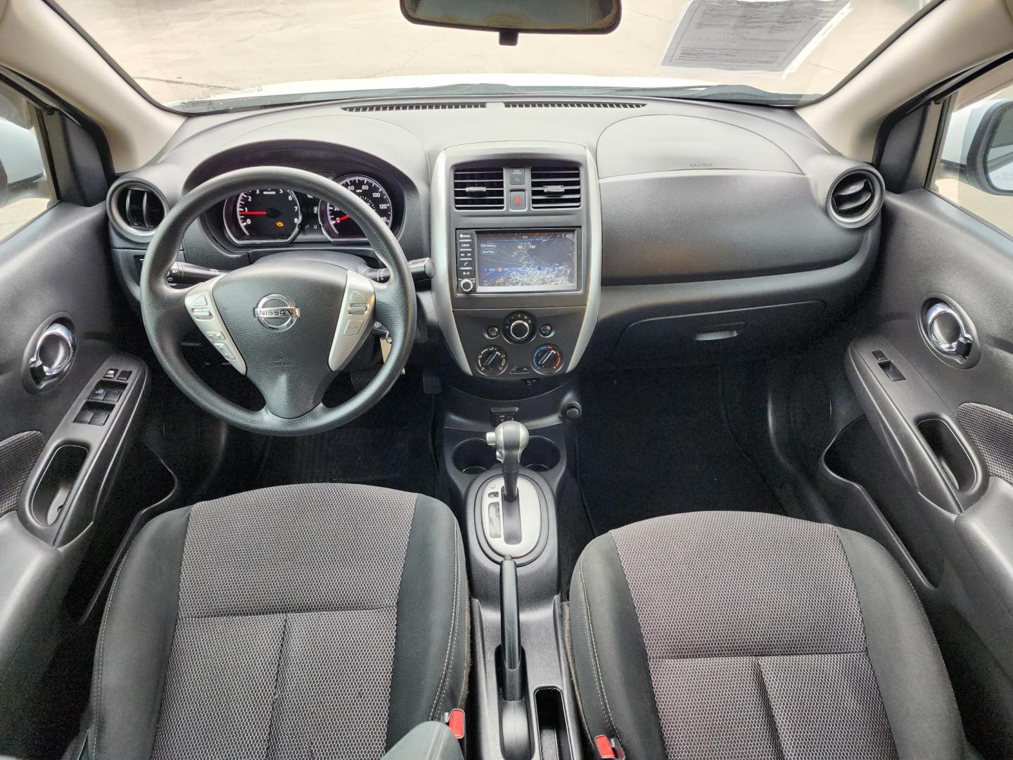 2019 White /Black Nissan Versa 1.6 SV Sedan (3N1CN7AP0KL) with an 1.6L L4 DOHC 16V engine, CVT transmission, located at 16710 Clay Rd., Houston, TX, 77084, (281) 859-7900, 29.834864, -95.656166 - Photo#9