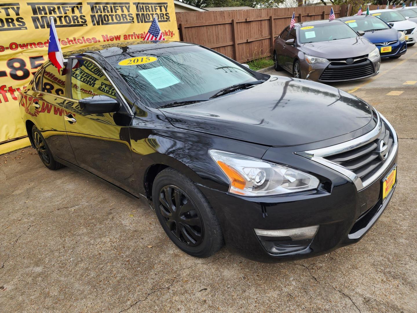 2015 Black /Black Nissan Altima 2.5 S (1N4AL3AP0FC) with an 2.5L L4 DOHC 16V engine, Continuously Variable Transmission transmission, located at 16710 Clay Rd., Houston, TX, 77084, (281) 859-7900, 29.834864, -95.656166 - Photo#2