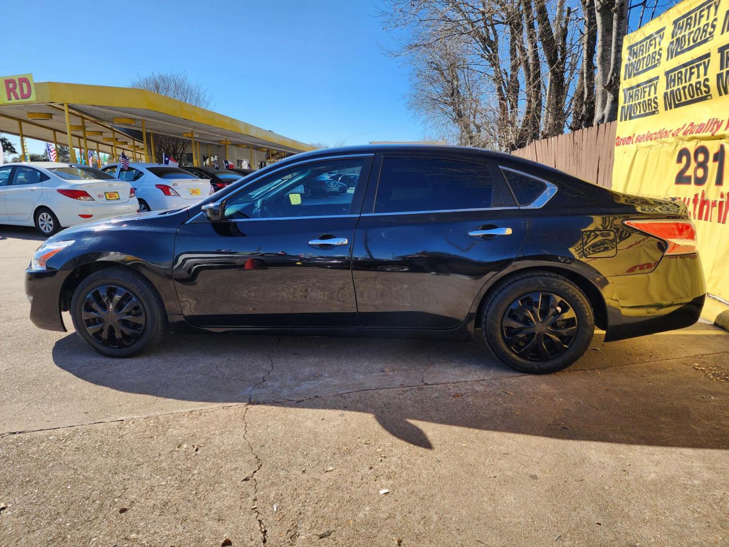 2015 Black /Black Nissan Altima 2.5 S (1N4AL3AP0FC) with an 2.5L L4 DOHC 16V engine, Continuously Variable Transmission transmission, located at 16710 Clay Rd., Houston, TX, 77084, (281) 859-7900, 29.834864, -95.656166 - Photo#4