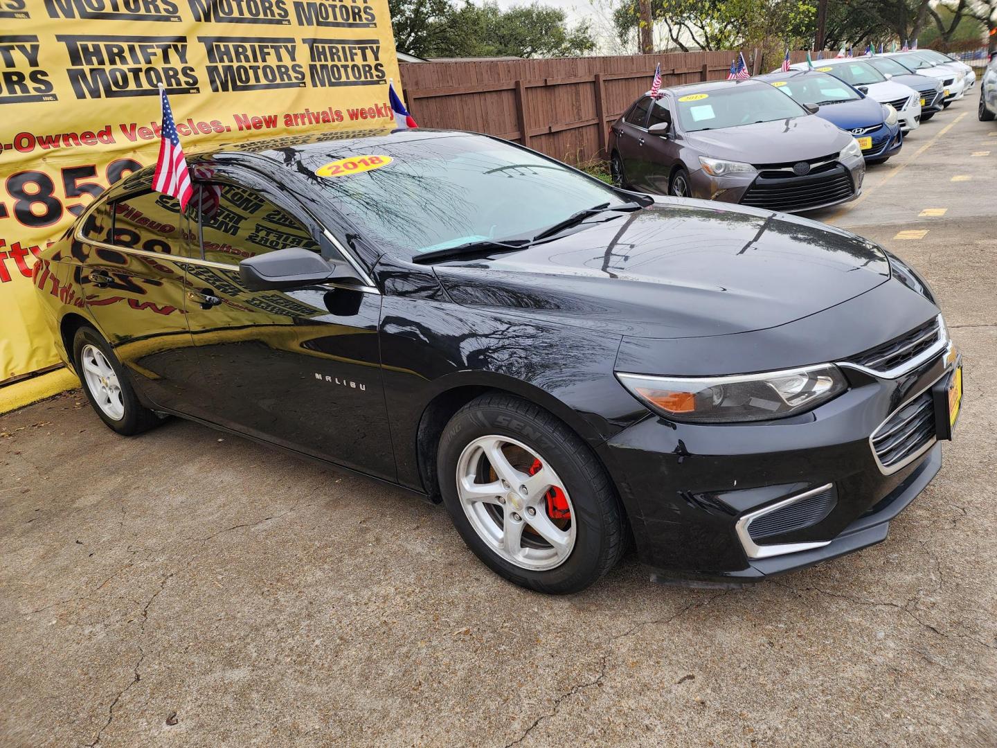 2018 Black /Black Chevrolet Malibu LS (1G1ZB5ST2JF) with an 1.5L L4 DOHC 16V engine, 6A transmission, located at 16710 Clay Rd., Houston, TX, 77084, (281) 859-7900, 29.834864, -95.656166 - Photo#2