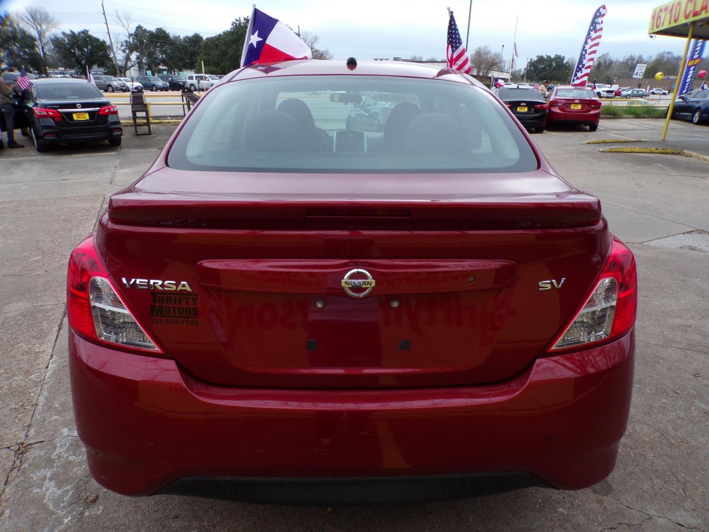 2018 Red /Gray Nissan Versa 1.6 SL Sedan (3N1CN7AP5JL) with an 1.6L L4 DOHC 16V engine, CVT transmission, located at 16710 Clay Rd., Houston, TX, 77084, (281) 859-7900, 29.834864, -95.656166 - Photo#5