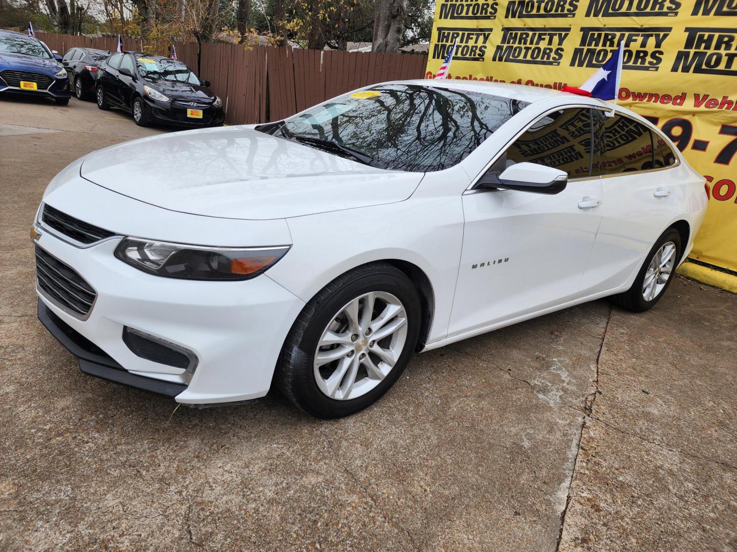 2018 White /Gray Chevrolet Malibu LT (1G1ZD5STXJF) with an 1.5L L4 DOHC 16V engine, 6A transmission, located at 16710 Clay Rd., Houston, TX, 77084, (281) 859-7900, 29.834864, -95.656166 - Photo#1