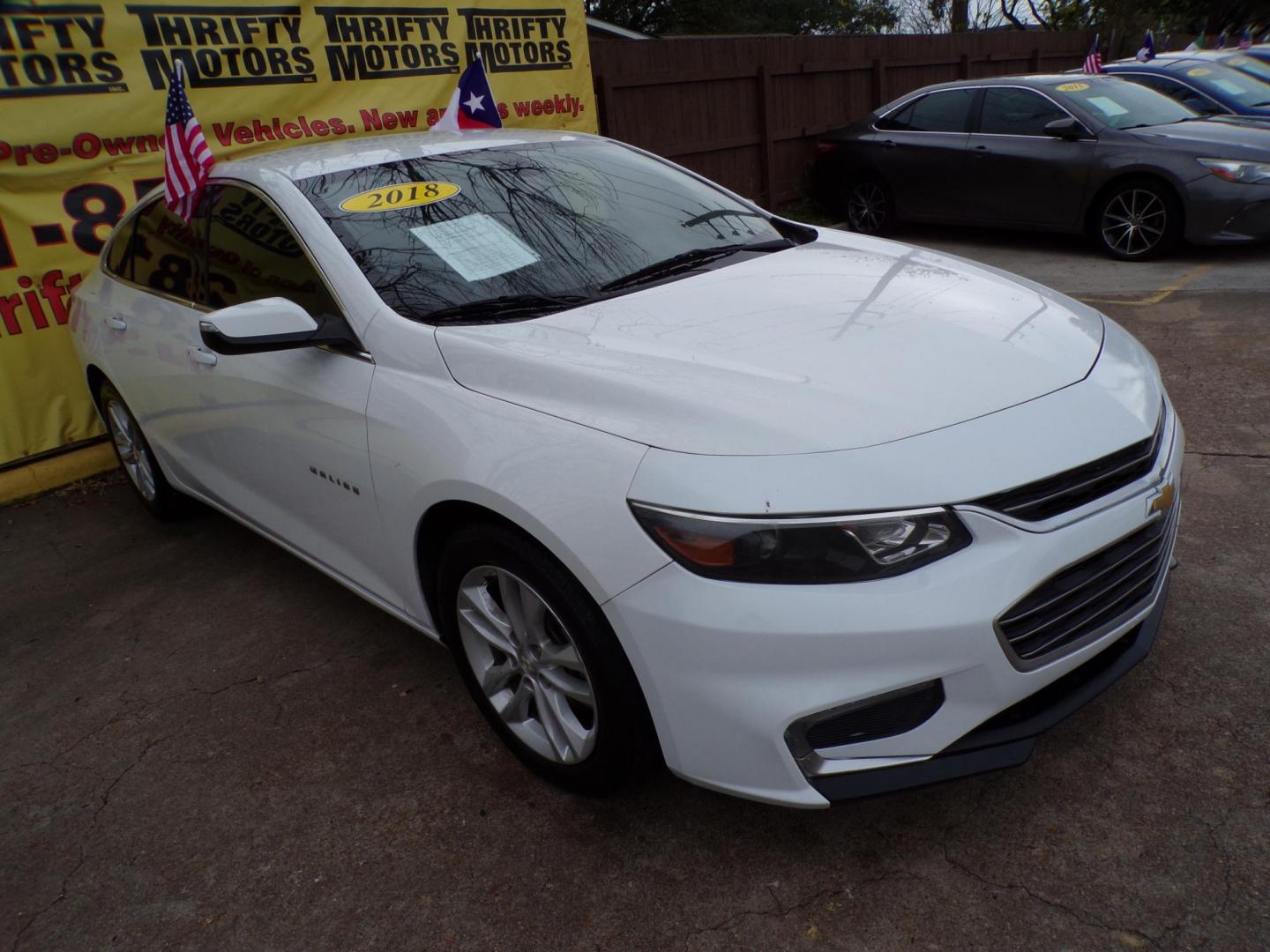 2018 White /Gray Chevrolet Malibu LT (1G1ZD5STXJF) with an 1.5L L4 DOHC 16V engine, 6A transmission, located at 16710 Clay Rd., Houston, TX, 77084, (281) 859-7900, 29.834864, -95.656166 - Photo#2