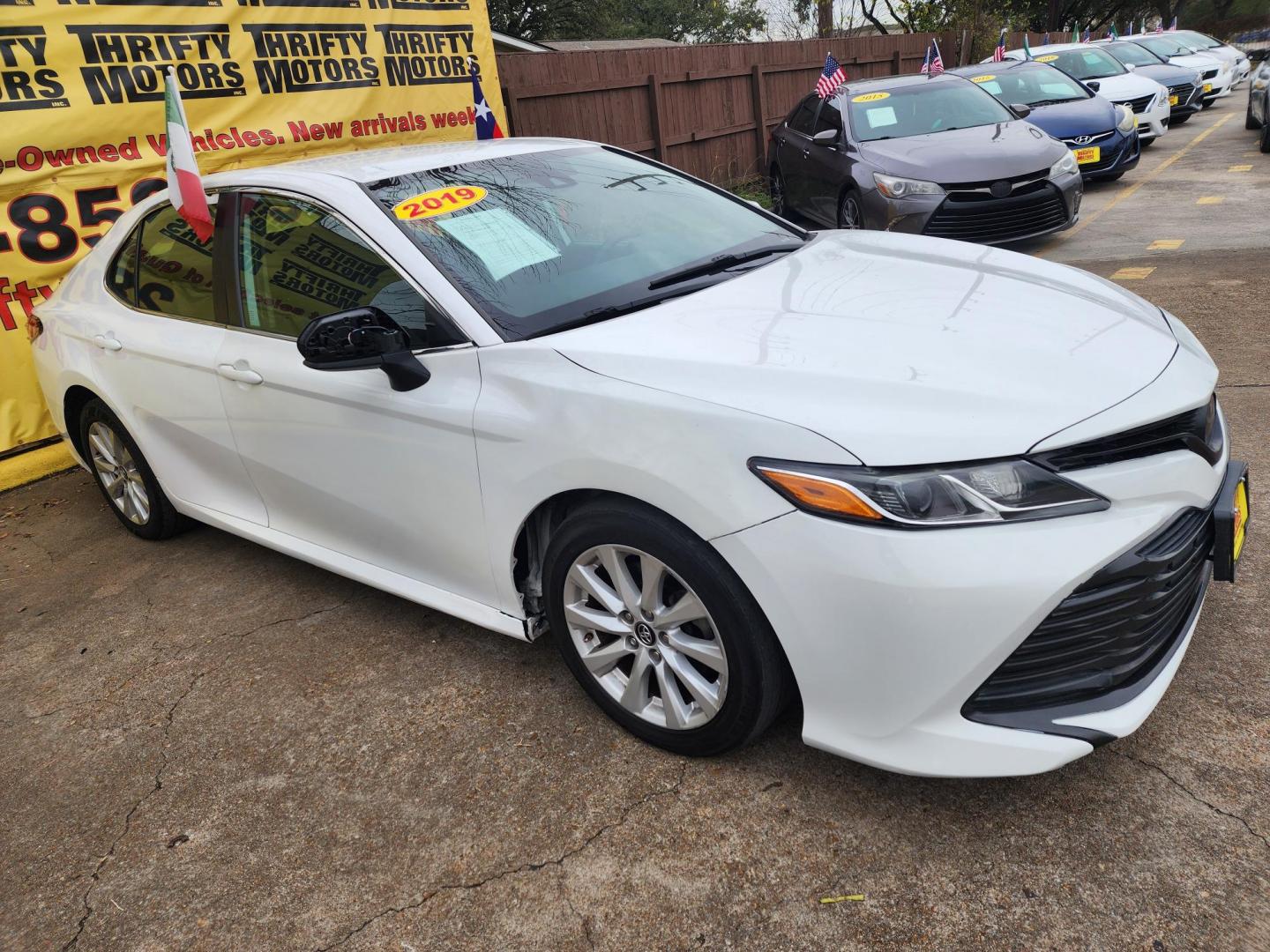 2019 White /Gray Toyota Camry LE (4T1B11HK2KU) with an 2.5L L4 DOHC 16V engine, 8A transmission, located at 16710 Clay Rd., Houston, TX, 77084, (281) 859-7900, 29.834864, -95.656166 - Photo#2