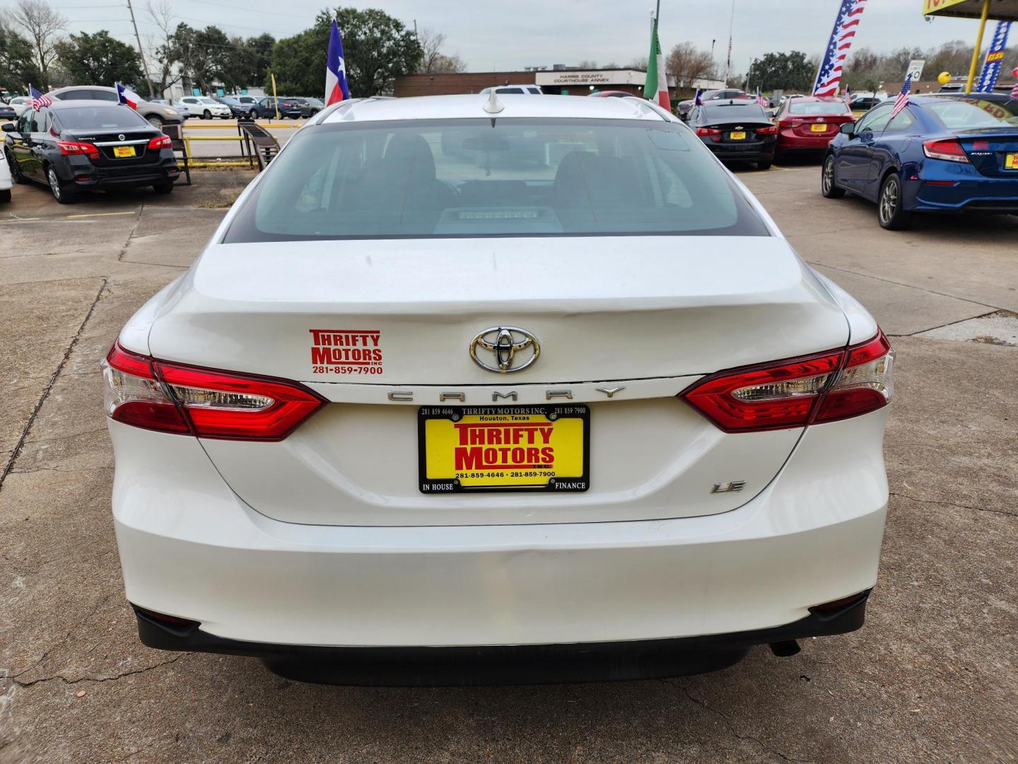 2019 White /Gray Toyota Camry LE (4T1B11HK2KU) with an 2.5L L4 DOHC 16V engine, 8A transmission, located at 16710 Clay Rd., Houston, TX, 77084, (281) 859-7900, 29.834864, -95.656166 - Photo#5