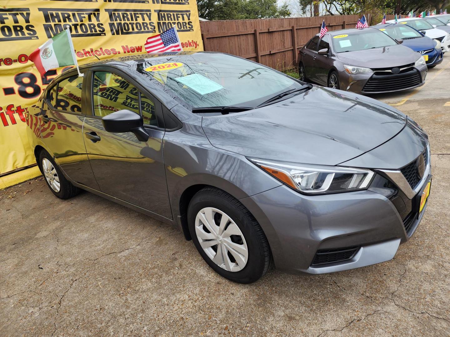 2021 Gray /Gray Nissan Versa S CVT (3N1CN8DV5ML) with an 1.6L L4 DOHC 16V engine, CVT transmission, located at 16710 Clay Rd., Houston, TX, 77084, (281) 859-7900, 29.834864, -95.656166 - Photo#2