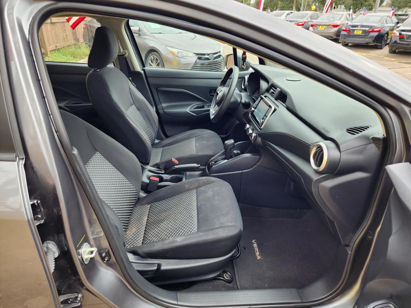 2021 Gray /Gray Nissan Versa S CVT (3N1CN8DV5ML) with an 1.6L L4 DOHC 16V engine, CVT transmission, located at 16710 Clay Rd., Houston, TX, 77084, (281) 859-7900, 29.834864, -95.656166 - Photo#12