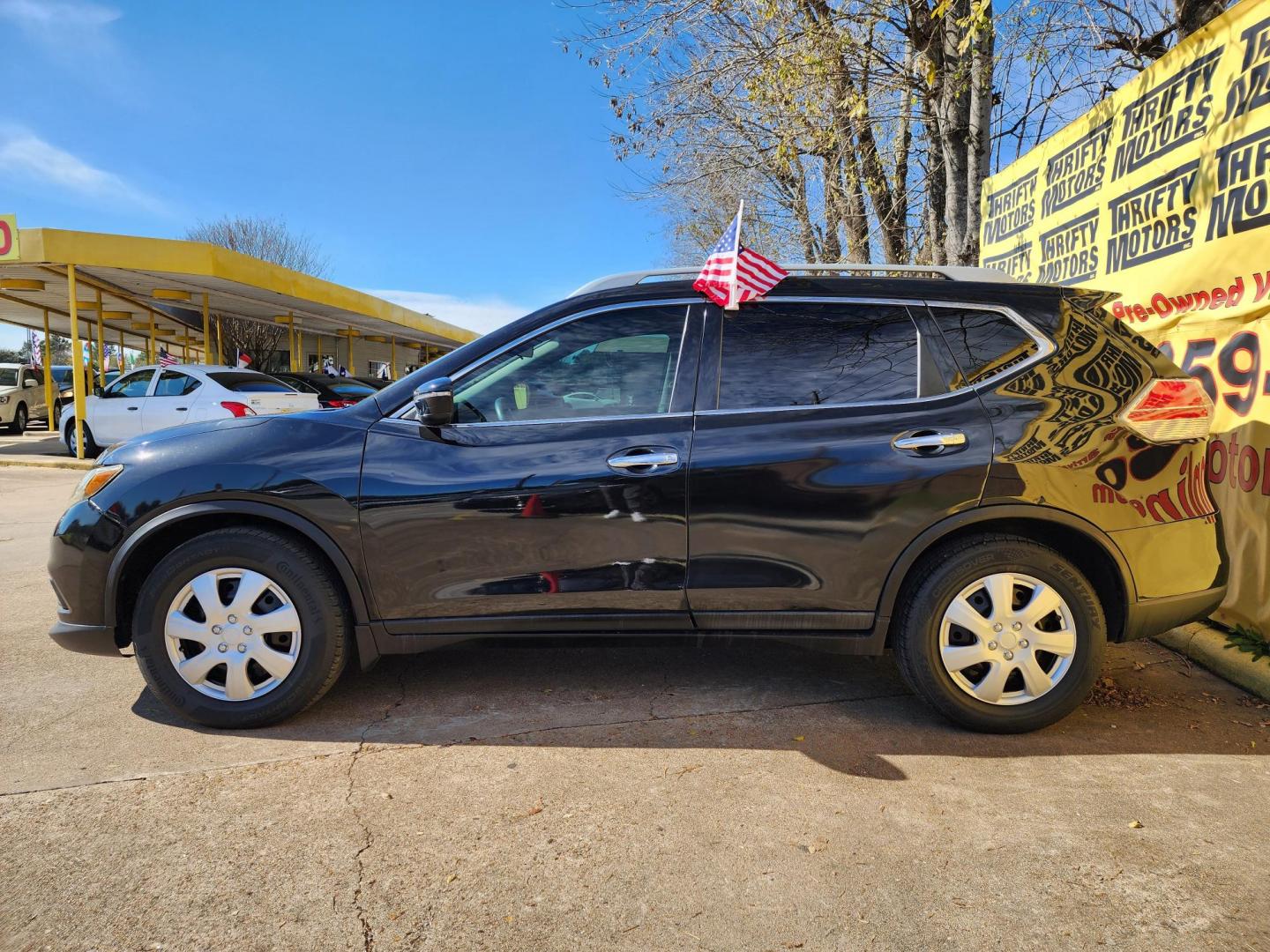 2016 Black /Gray Nissan Rogue S 2WD (5N1AT2MT1GC) with an 2.5L L4 DOHC 16V engine, CVT transmission, located at 16710 Clay Rd., Houston, TX, 77084, (281) 859-7900, 29.834864, -95.656166 - Photo#4