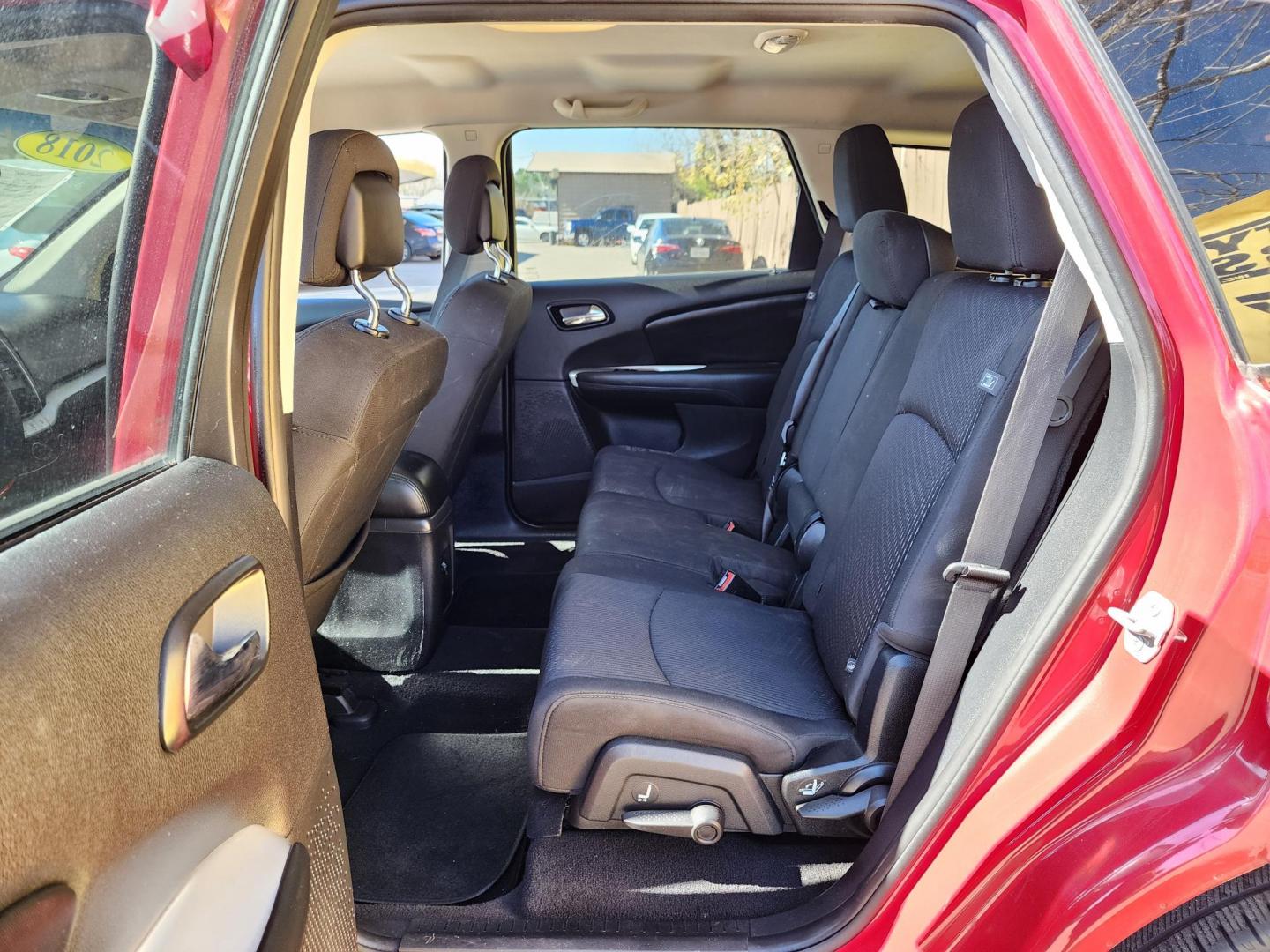 2018 Red /Black Dodge Journey SE (3C4PDCAB0JT) with an 2.4L L4 DOHC 16V engine, Automatic transmission, located at 16710 Clay Rd., Houston, TX, 77084, (281) 859-7900, 29.834864, -95.656166 - Photo#11