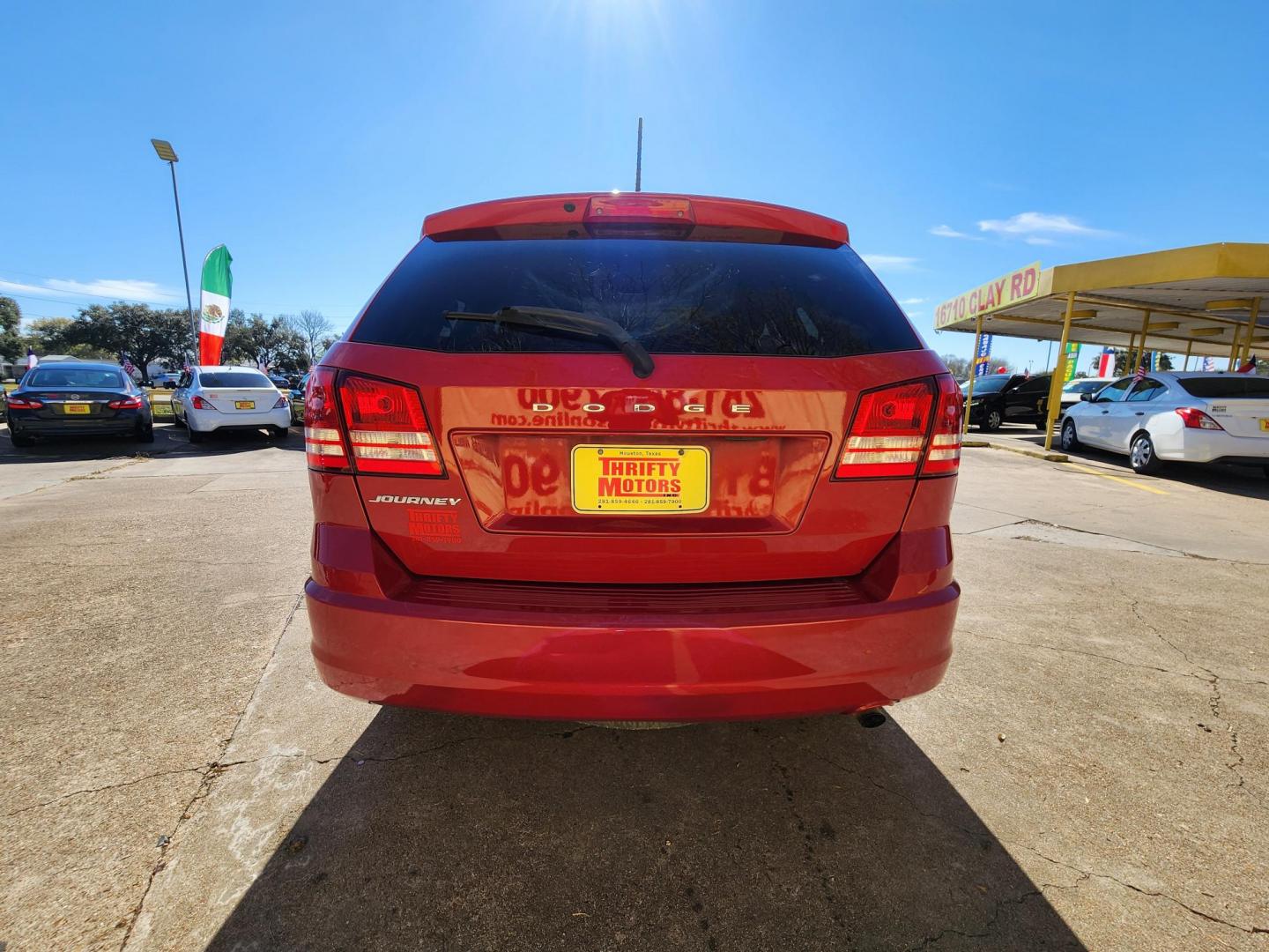 2018 Red /Black Dodge Journey SE (3C4PDCAB0JT) with an 2.4L L4 DOHC 16V engine, Automatic transmission, located at 16710 Clay Rd., Houston, TX, 77084, (281) 859-7900, 29.834864, -95.656166 - Photo#5