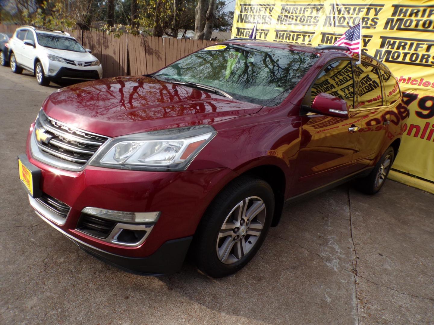 2017 Red /Gray Chevrolet Traverse 1LT FWD (1GNKRGKD0HJ) with an 3.6L V6 DOHC 24V engine, 6A transmission, located at 16710 Clay Rd., Houston, TX, 77084, (281) 859-7900, 29.834864, -95.656166 - Photo#1