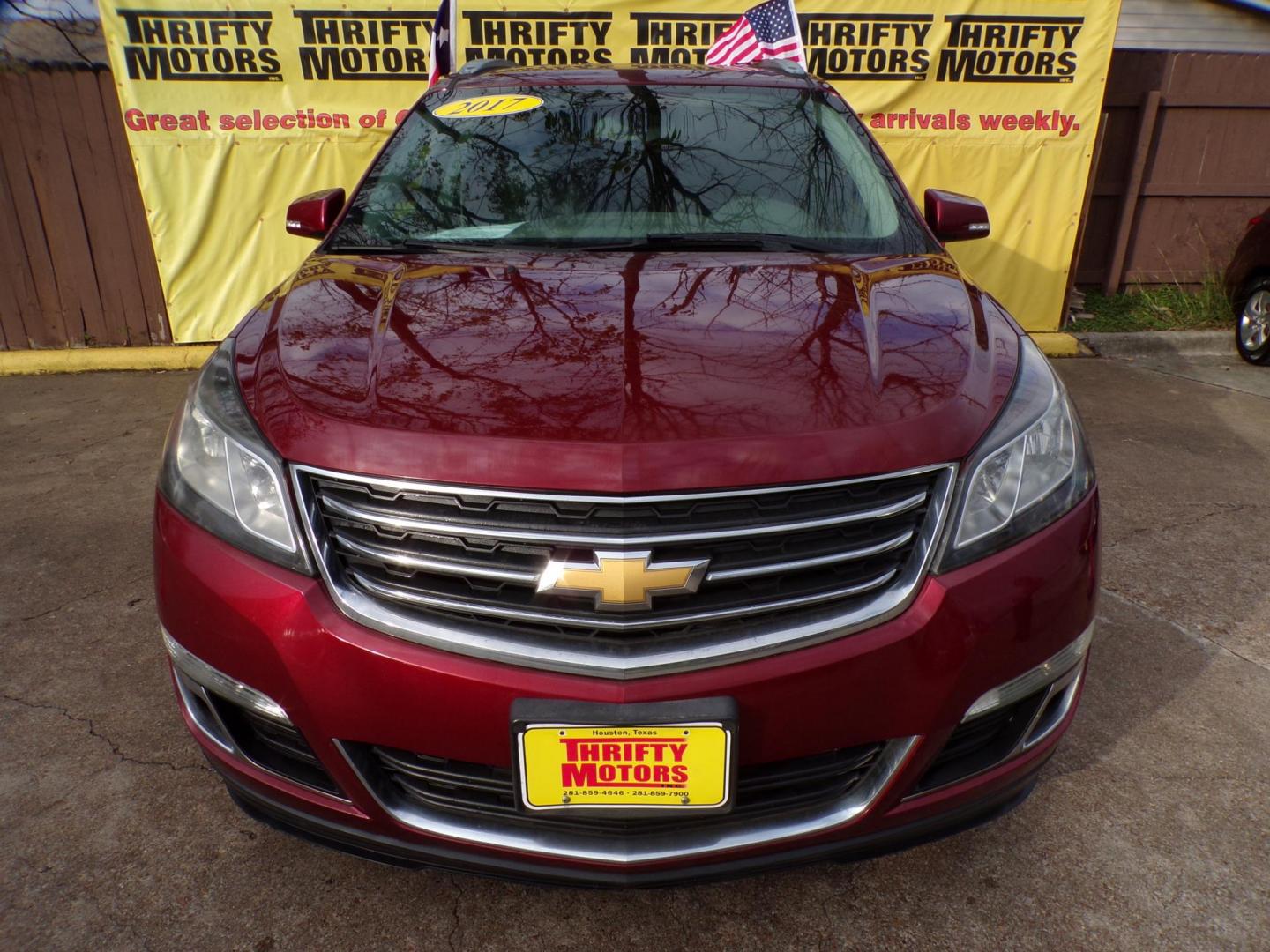 2017 Red /Gray Chevrolet Traverse 1LT FWD (1GNKRGKD0HJ) with an 3.6L V6 DOHC 24V engine, 6A transmission, located at 16710 Clay Rd., Houston, TX, 77084, (281) 859-7900, 29.834864, -95.656166 - Photo#0