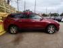 2017 Red /Gray Chevrolet Traverse 1LT FWD (1GNKRGKD0HJ) with an 3.6L V6 DOHC 24V engine, 6A transmission, located at 16710 Clay Rd., Houston, TX, 77084, (281) 859-7900, 29.834864, -95.656166 - Photo#3