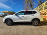 2016 White /Gray Nissan Rogue S 2WD (KNMAT2MT7GP) with an 2.5L L4 DOHC 16V engine, CVT transmission, located at 16710 Clay Rd., Houston, TX, 77084, (281) 859-7900, 29.834864, -95.656166 - Photo#4