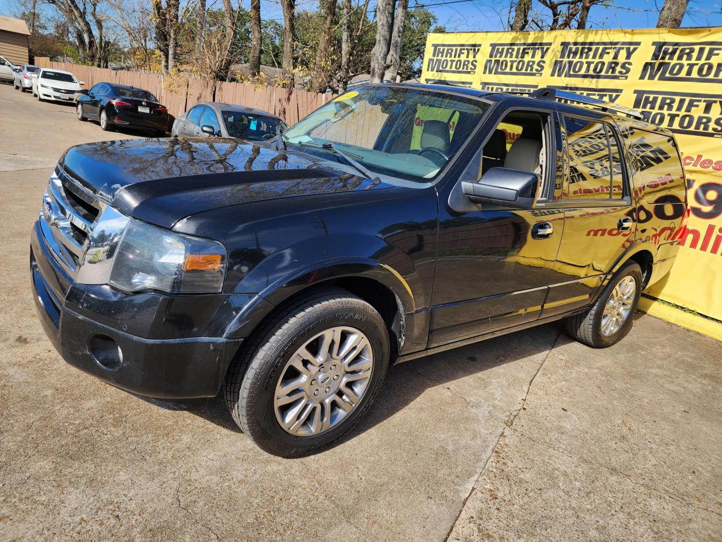 2014 Black /Tan Ford Expedition Limited 2WD (1FMJU1K58EE) with an 5.4L V8 SOHC 16V FFV engine, 6-Speed Automatic transmission, located at 16710 Clay Rd., Houston, TX, 77084, (281) 859-7900, 29.834864, -95.656166 - Photo#1