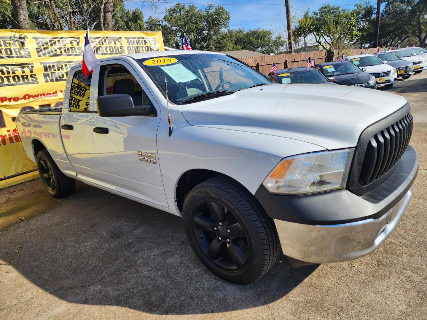 2018 White /Gray RAM 1500 Tradesman Quad Cab 2WD (1C6RR6FG7JS) with an 3.6L V6 DOHC 24V FFV engine, 8A transmission, located at 16710 Clay Rd., Houston, TX, 77084, (281) 859-7900, 29.834864, -95.656166 - Photo#2