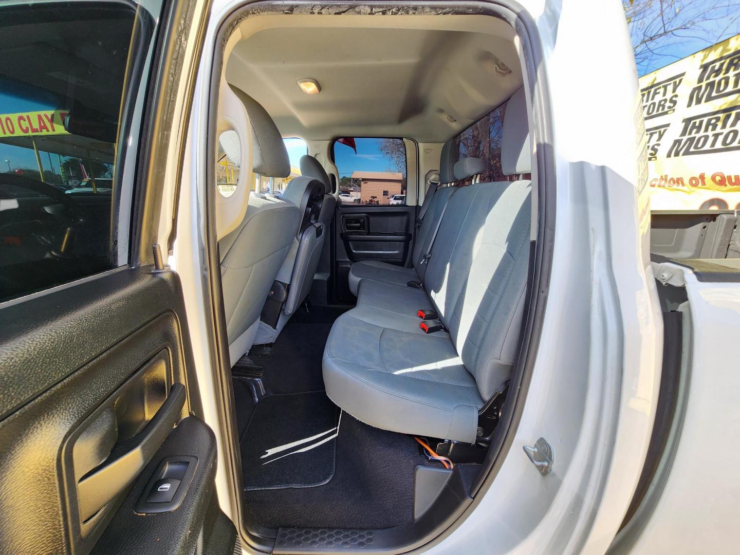 2018 White /Gray RAM 1500 Tradesman Quad Cab 2WD (1C6RR6FG7JS) with an 3.6L V6 DOHC 24V FFV engine, 8A transmission, located at 16710 Clay Rd., Houston, TX, 77084, (281) 859-7900, 29.834864, -95.656166 - Photo#7