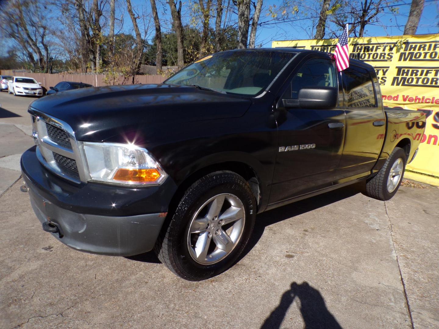 2011 Black /Gray Dodge Ram 1500 SLT Crew Cab 4WD (1D7RV1CP8BS) with an 4.7L V8 SOHC 16V FFV engine, 5-Speed Automatic transmission, located at 16710 Clay Rd., Houston, TX, 77084, (281) 859-7900, 29.834864, -95.656166 - Photo#1