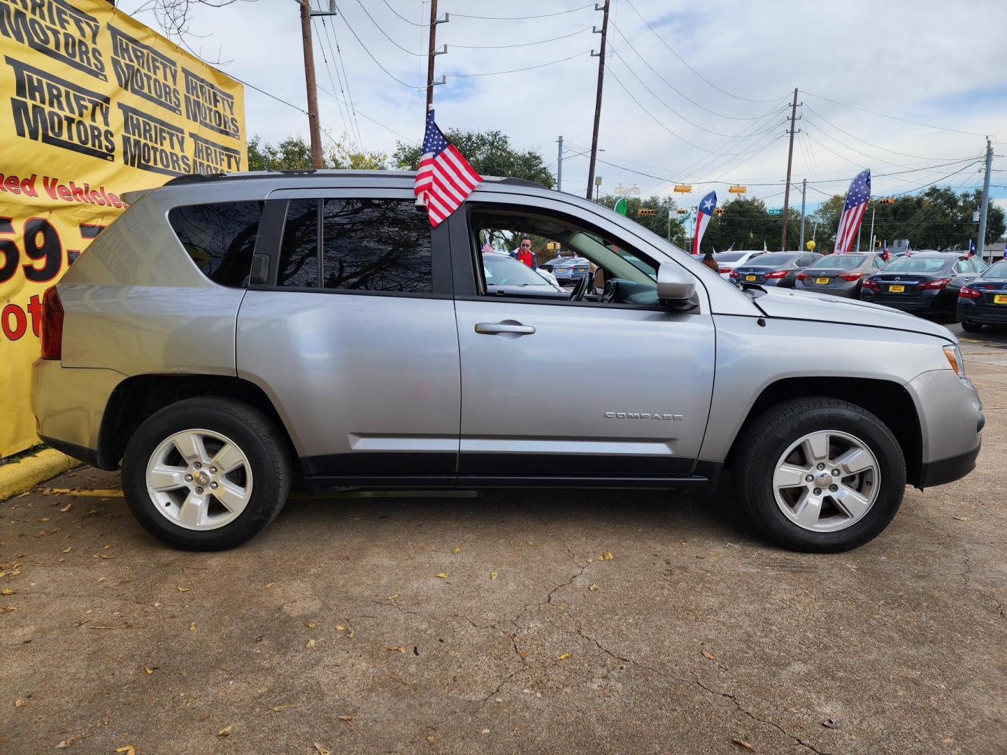 2017 Gray /Gray Jeep Compass Latitude FWD (1C4NJCEA8HD) with an 2.0L L4 DOHC 16V engine, Automatic transmission, located at 16710 Clay Rd., Houston, TX, 77084, (281) 859-7900, 29.834864, -95.656166 - Photo#3