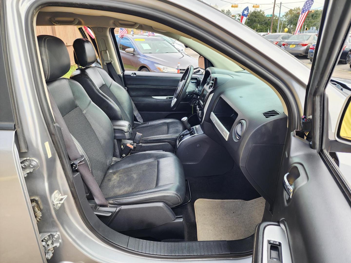 2017 Gray /Gray Jeep Compass Latitude FWD (1C4NJCEA8HD) with an 2.0L L4 DOHC 16V engine, Automatic transmission, located at 16710 Clay Rd., Houston, TX, 77084, (281) 859-7900, 29.834864, -95.656166 - Photo#12