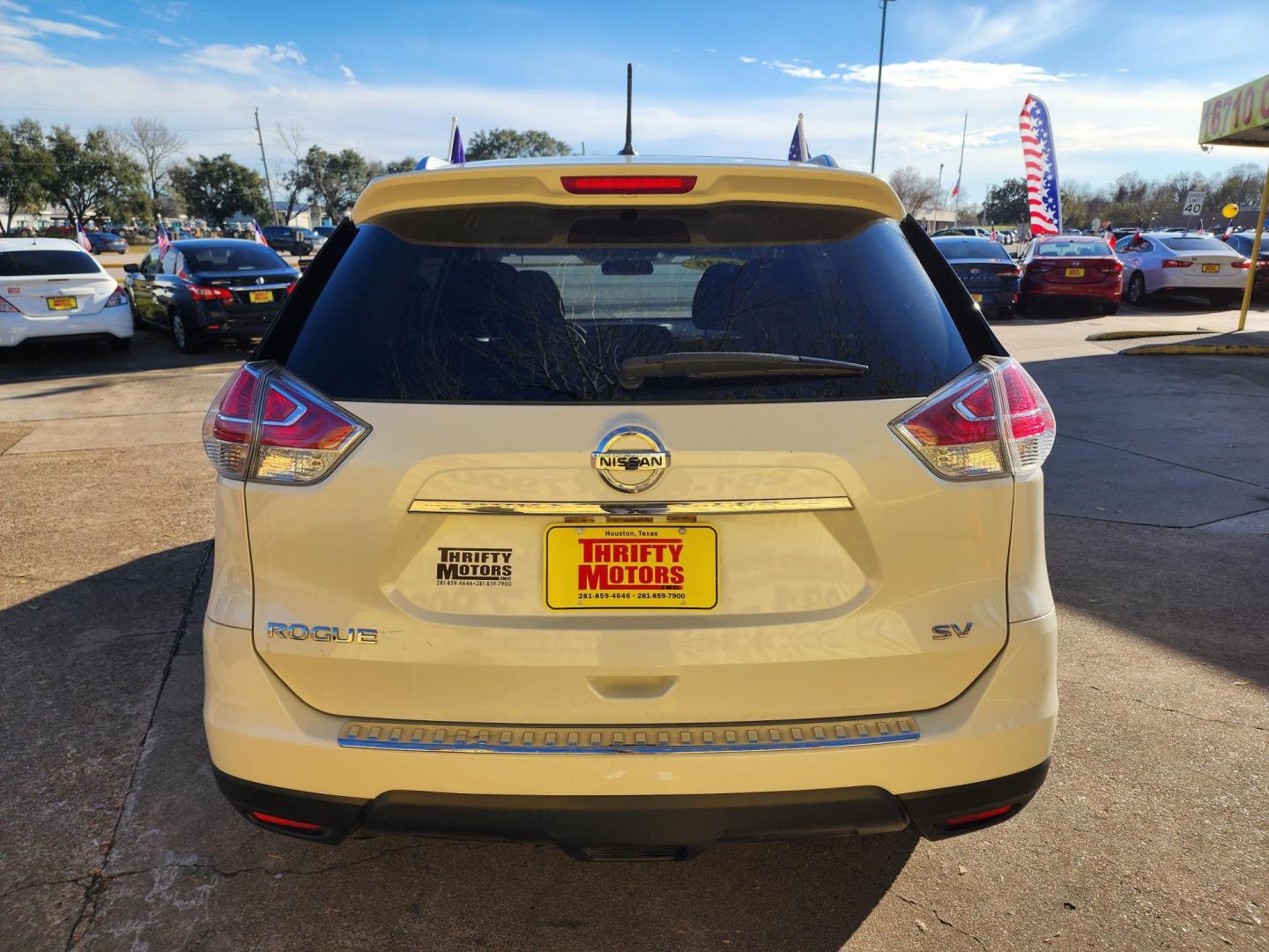 2016 White /Black Nissan Rogue S 2WD (JN8AT2MT0GW) with an 2.5L L4 DOHC 16V engine, CVT transmission, located at 16710 Clay Rd., Houston, TX, 77084, (281) 859-7900, 29.834864, -95.656166 - Photo#5