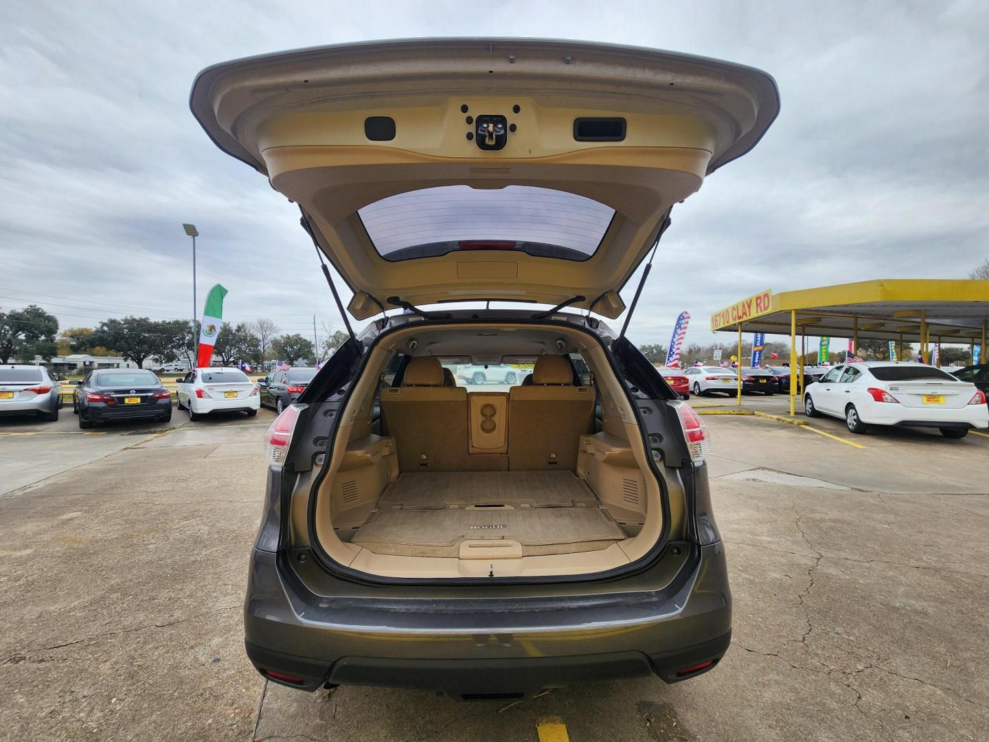 2015 Gray /Tan Nissan Rogue S 2WD (KNMAT2MTXFP) with an 2.5L L4 DOHC 16V engine, Continuously Variable Transmission transmission, located at 16710 Clay Rd., Houston, TX, 77084, (281) 859-7900, 29.834864, -95.656166 - Photo#16