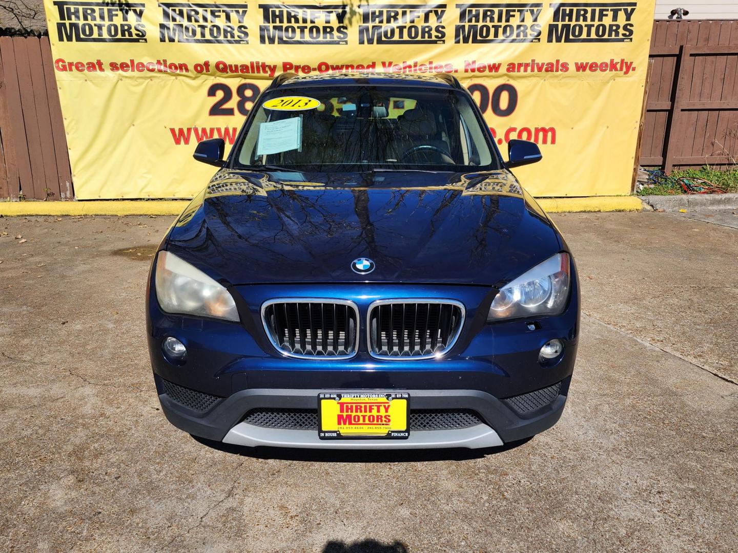 2013 Blue /Beige BMW X1 xDrive28i (WBAVL1C53DV) with an 2.0L L4 DOHC 16V engine, 8-Speed Automatic transmission, located at 16710 Clay Rd., Houston, TX, 77084, (281) 859-7900, 29.834864, -95.656166 - Photo#0