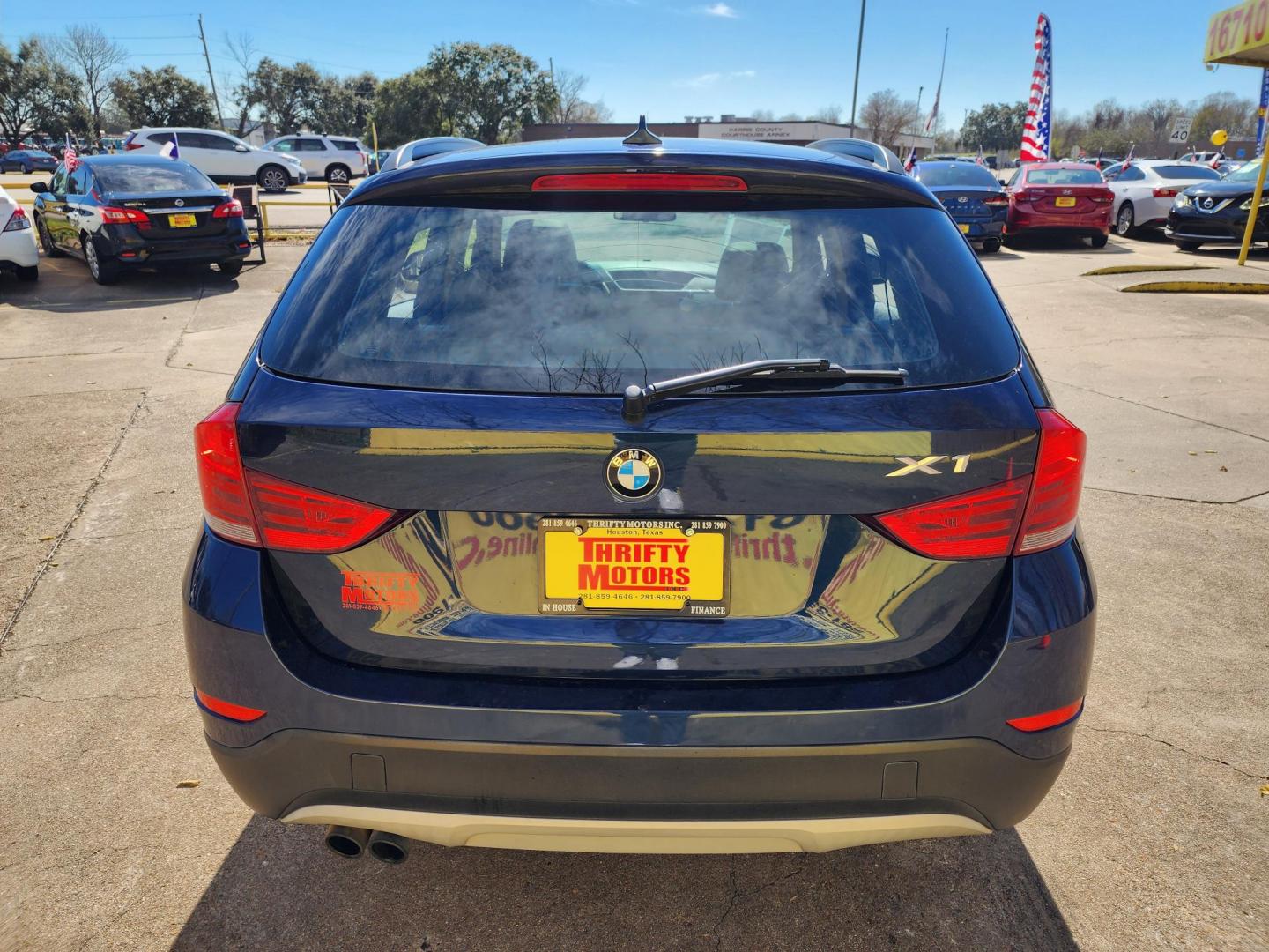 2013 Blue /Beige BMW X1 xDrive28i (WBAVL1C53DV) with an 2.0L L4 DOHC 16V engine, 8-Speed Automatic transmission, located at 16710 Clay Rd., Houston, TX, 77084, (281) 859-7900, 29.834864, -95.656166 - Photo#5