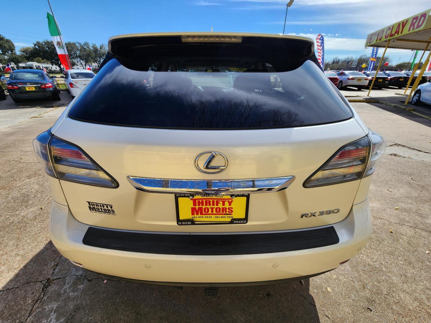 2012 White /Black Lexus RX 350 AWD (JTJBK1BAXC2) with an 3.5L V6 DOHC 24V engine, 5-Speed Automatic transmission, located at 16710 Clay Rd., Houston, TX, 77084, (281) 859-7900, 29.834864, -95.656166 - Photo#5