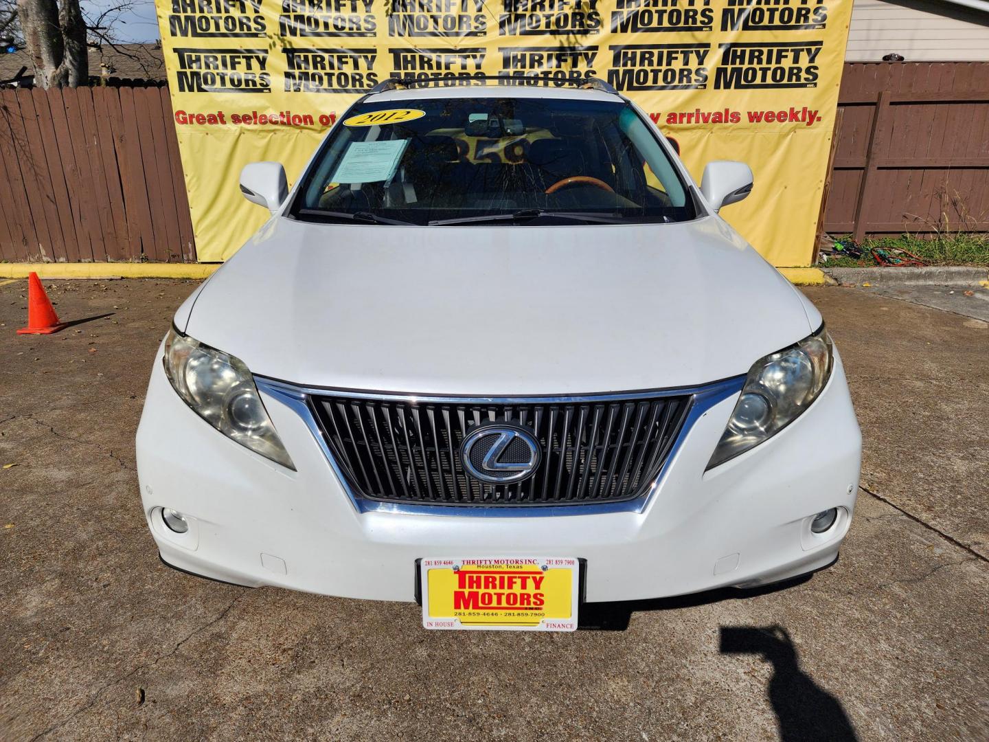 2012 White /Black Lexus RX 350 AWD (JTJBK1BAXC2) with an 3.5L V6 DOHC 24V engine, 5-Speed Automatic transmission, located at 16710 Clay Rd., Houston, TX, 77084, (281) 859-7900, 29.834864, -95.656166 - Photo#0