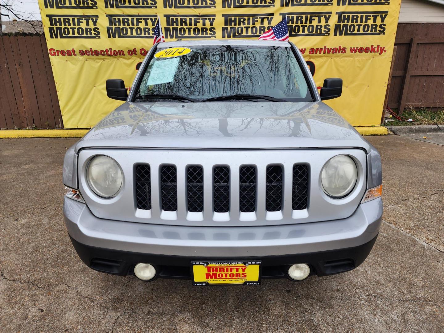 2014 Silver /Gray Jeep Patriot Latitude 2WD (1C4NJPFA0ED) with an 2.0L L4 DOHC 16V engine, located at 16710 Clay Rd., Houston, TX, 77084, (281) 859-7900, 29.834864, -95.656166 - Photo#0