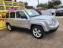 2014 Silver /Gray Jeep Patriot Latitude 2WD (1C4NJPFA0ED) with an 2.0L L4 DOHC 16V engine, located at 16710 Clay Rd., Houston, TX, 77084, (281) 859-7900, 29.834864, -95.656166 - Photo#2