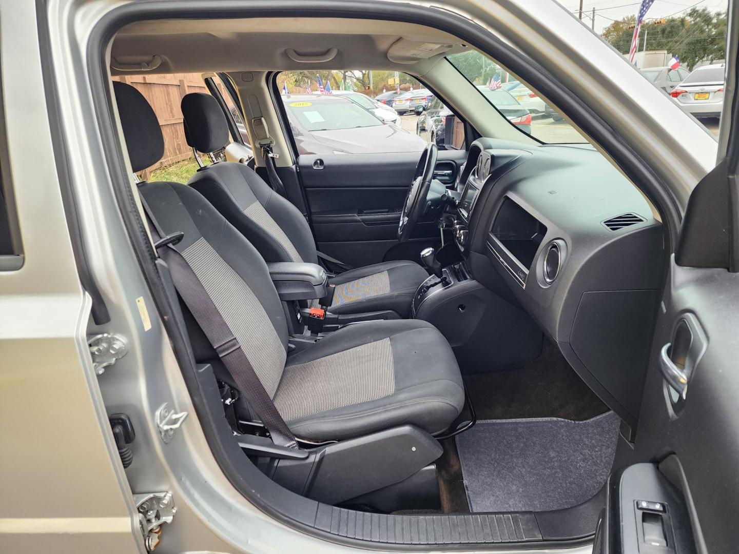 2014 Silver /Gray Jeep Patriot Latitude 2WD (1C4NJPFA0ED) with an 2.0L L4 DOHC 16V engine, located at 16710 Clay Rd., Houston, TX, 77084, (281) 859-7900, 29.834864, -95.656166 - Photo#13