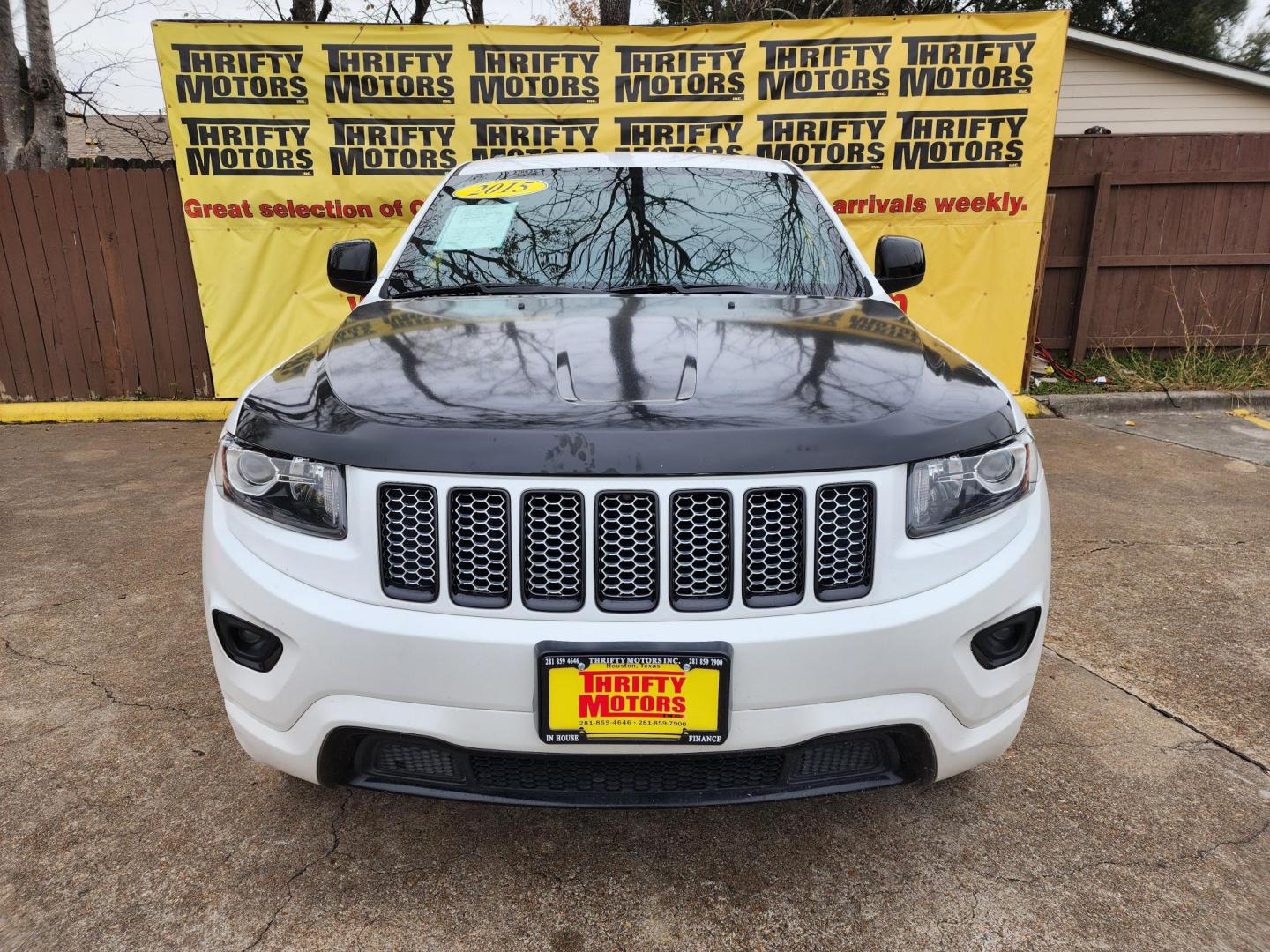 2015 White /Black Jeep Grand Cherokee Laredo 4WD (1C4RJFAG3FC) with an 3.6L V6 DOHC 24V engine, 8-Speed Automatic transmission, located at 16710 Clay Rd., Houston, TX, 77084, (281) 859-7900, 29.834864, -95.656166 - Photo#0